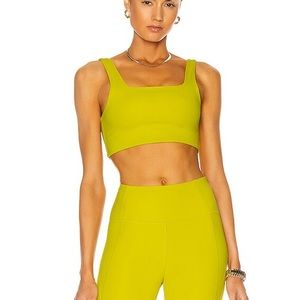 girlfriend collective chartreuse high rise bike shorts and tommy bra